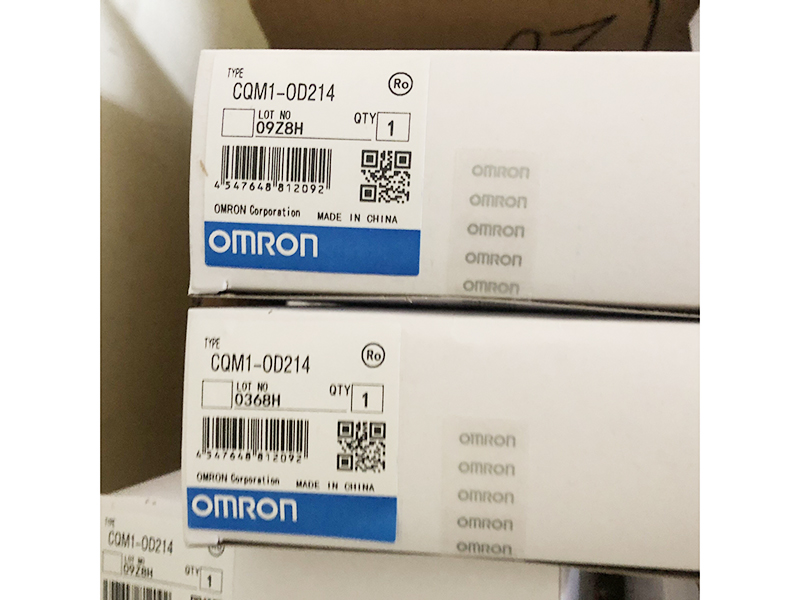 new Omron CQM1-0D214 module